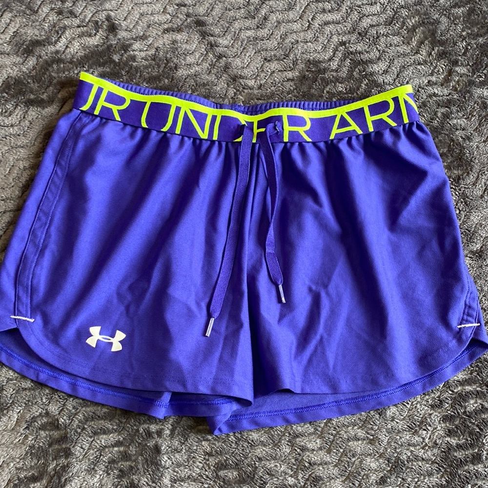 Under armor size small, athletic shorts, purple and yellow